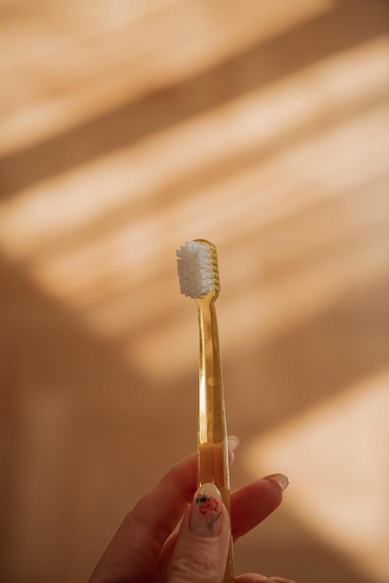 old toothbrush by Anastasija Thirsty for tan